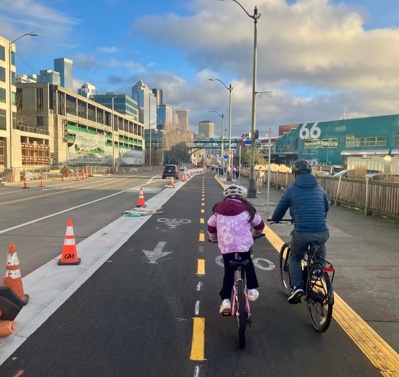 Parent and Child Biking on the Alaskan Way Bike Path