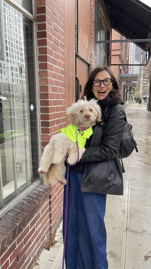Catherine Fleming and dog on 9th Ave in SLU, right by the bike lanes.