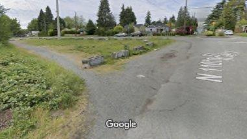 The trail abruptly ends at an unsafe intersection with bad sightlines.