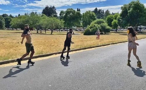 People Skaing on Lake Washington Boulevard