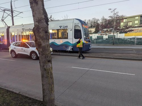 Link train on MLK Way damaged by a car